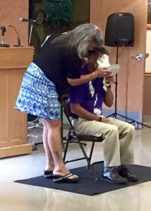 Susie Comer smashes a pie in the face of Harford County Executive Barry Glassman for a good cause.