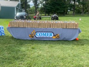Comer Construction booth with loot bags at the National Night Out in Harford County
