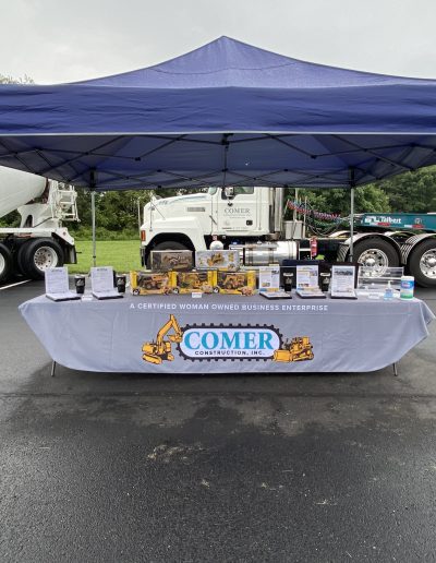 Comer Construction Booth with prizes at Touch a Truck