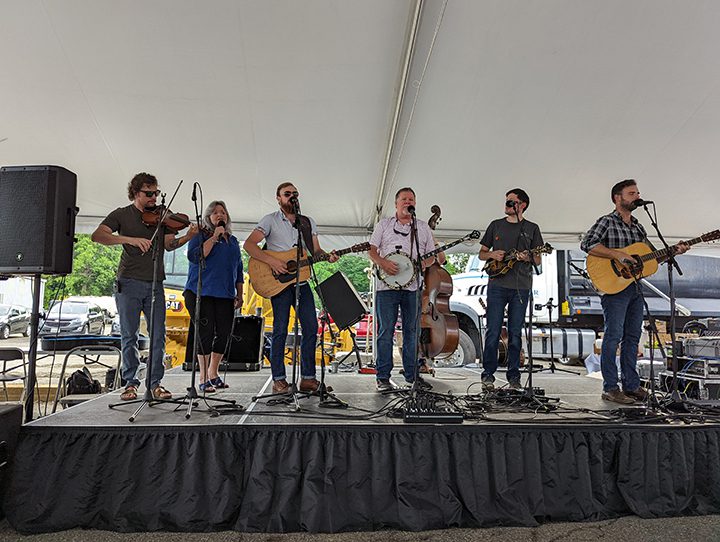 Susie on stage with Bluegrass band Sideline during the Comer Construction’s 40th Anniversary Celebration
