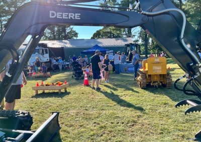 National Night Out attendees enjoy the heavy machinery displays with their children