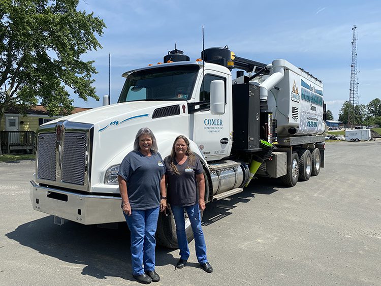 Leona and Susie with Comer Hydrovac Truck