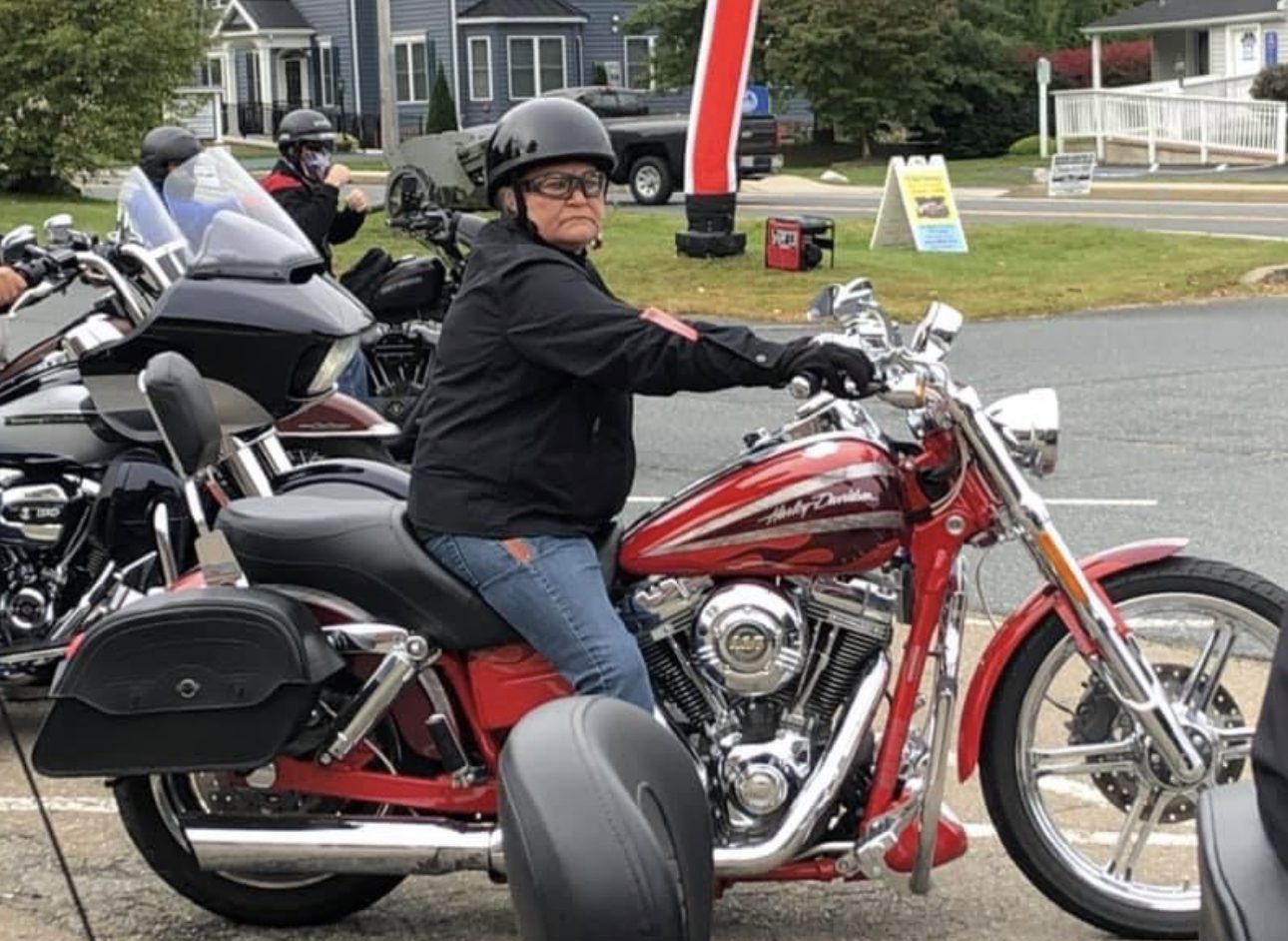 Leona riding a motorcycle