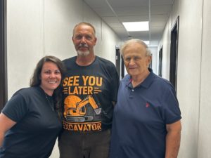 Charles Petr with coworkers