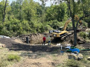 grading and excavation in progress at construction site