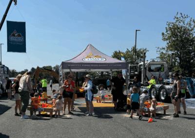 Comer Construction vehicles at a local touch-a-truck event