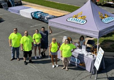 Comer Construction vehicles at a local touch-a-truck event