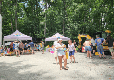 Comer Construction vehicles at a local touch-a-truck event