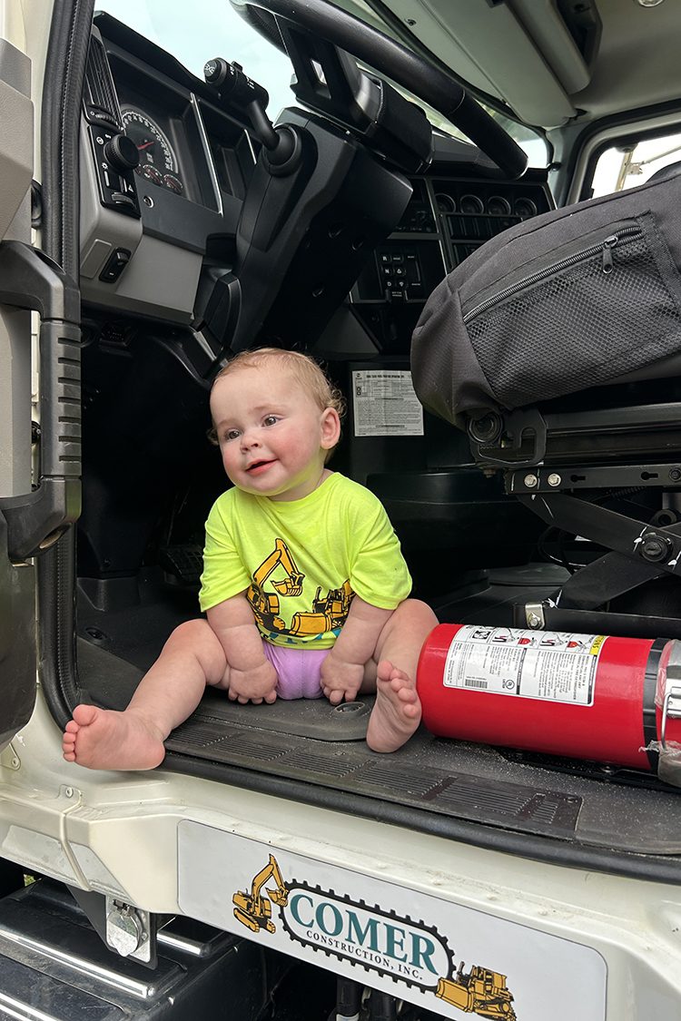Baby in a Comer truck at National Night Out