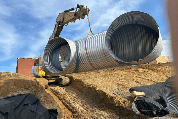 excavator lifting pipe section