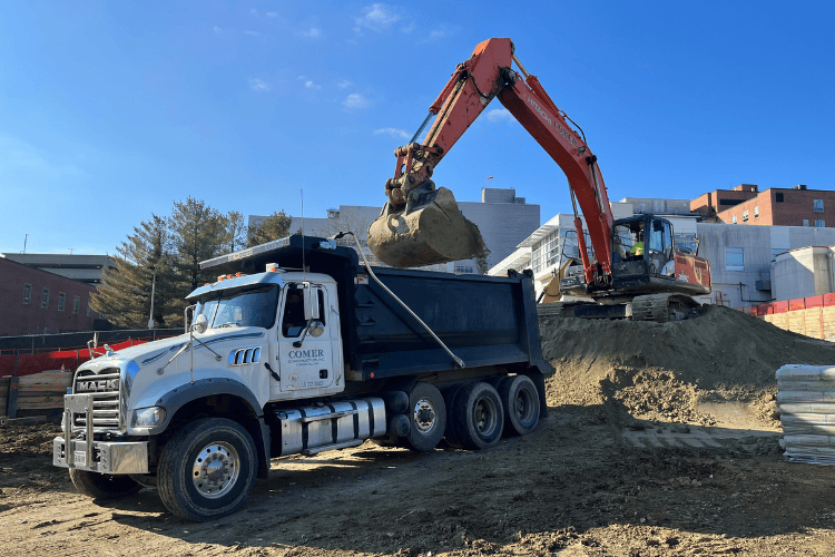 excavators moving dirt at Sinai in Baltimore